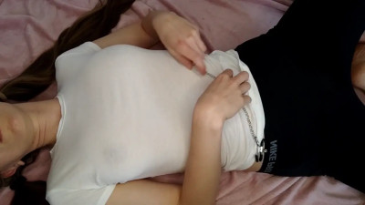 Using nipple clamps with chain for pleasure moans