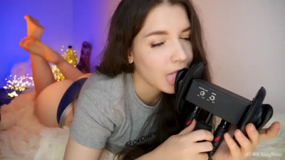 KittieClaw earlicking in bed wearing shirt and panties