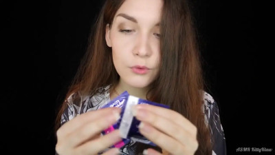 KittieClaw having fun with condoms