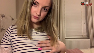Cute blonde silently playing with her breasts