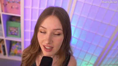 Jerking the microphone soft cover with seducing whispers